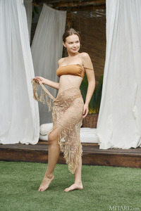 Yenn Cat Smiles Flirtatiously As She Unties Her Sarong And Takes Off Her Bikini Top