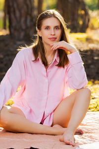 Aristeia Parts Her Soft Thighs To Frame The Intricate Folds Of Her Shaved Pussy