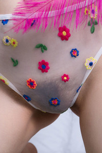 Enid Parting Her Soft Thighs For An Intimate View Of Her Hairy Pussy