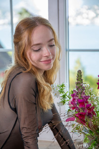 Rinna Ly Blue-eyed Sweetie’s Sultry Pout Gives Way To A Flirtatious Smile