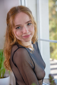 Rinna Ly Blue-eyed Sweetie’s Sultry Pout Gives Way To A Flirtatious Smile