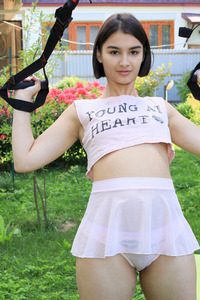 Sasha Xray Strikes A Series Of Yoga Poses That Show Off Her Lithe Figure