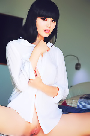 Malena Undressing In A Hotel Room