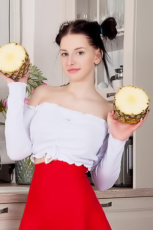 Busty Teen Posing In The Kitchen
