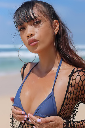IyaQ Posing On The Beach In Bikini