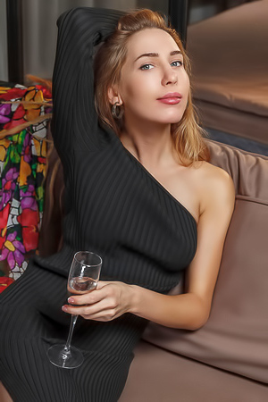 Madelina Blue-eyed Seductress Strips Down To Her Nylons