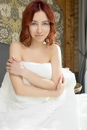 Rosalind Parts Her Slender Thighs To Frame Her Shaved Pussy