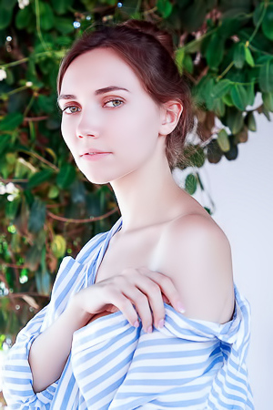 Danniela Unbuttoning Her Striped Shirt To Reveal Her Perfect Breasts