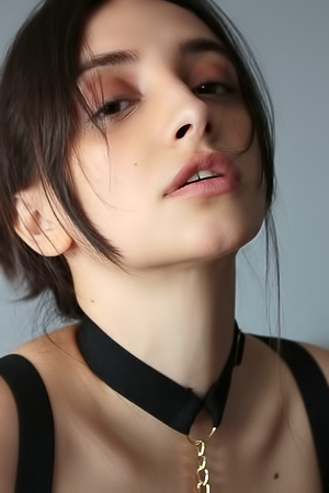 Olivia Linz Her Passionate Gaze Conveying Her Erotic Thoughts