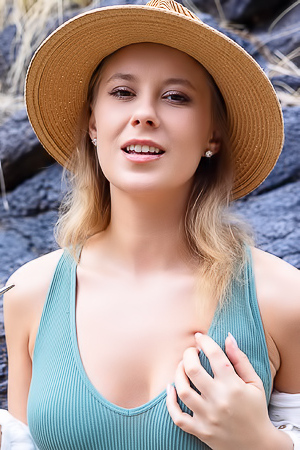 Casey Jones Teases Outdoors With Long Hair And Wide Spread Legs In A Sexy Striptease