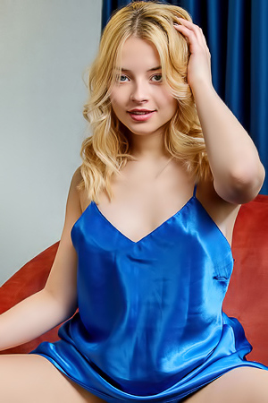 Bianca Bell Teases With Unbuttoned Chemise Lounging On Armchair