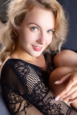 Luna Art teases on chair, boobs bouncing in bodysuit